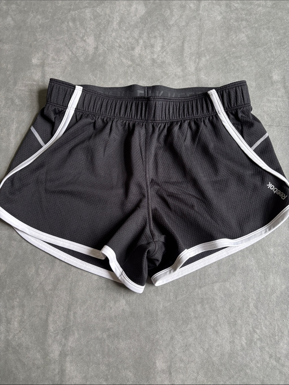 Reebok Black Women's Athletic Shorts with White Trim. Size M